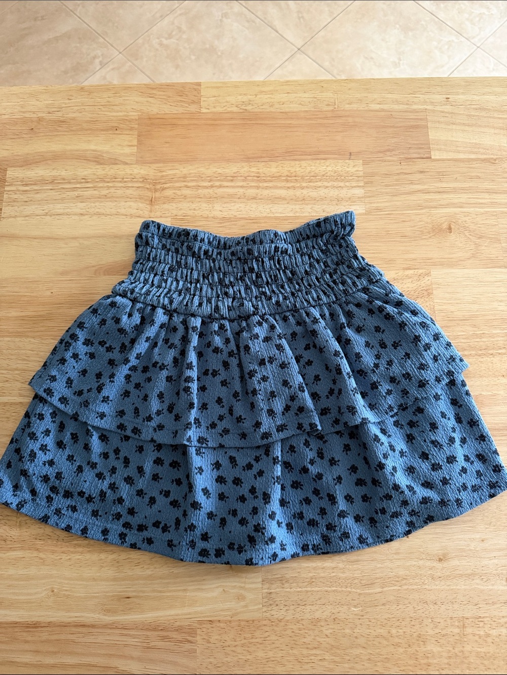 Zara Smocked Tiered Mini Skirt in Blue with Black Floral Print size 9
